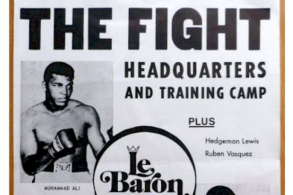 This image is a vintage fight poster promoting a training camp and headquarters at Le Baron Hotel, featuring boxers in training, including Hedgemon Lewis.