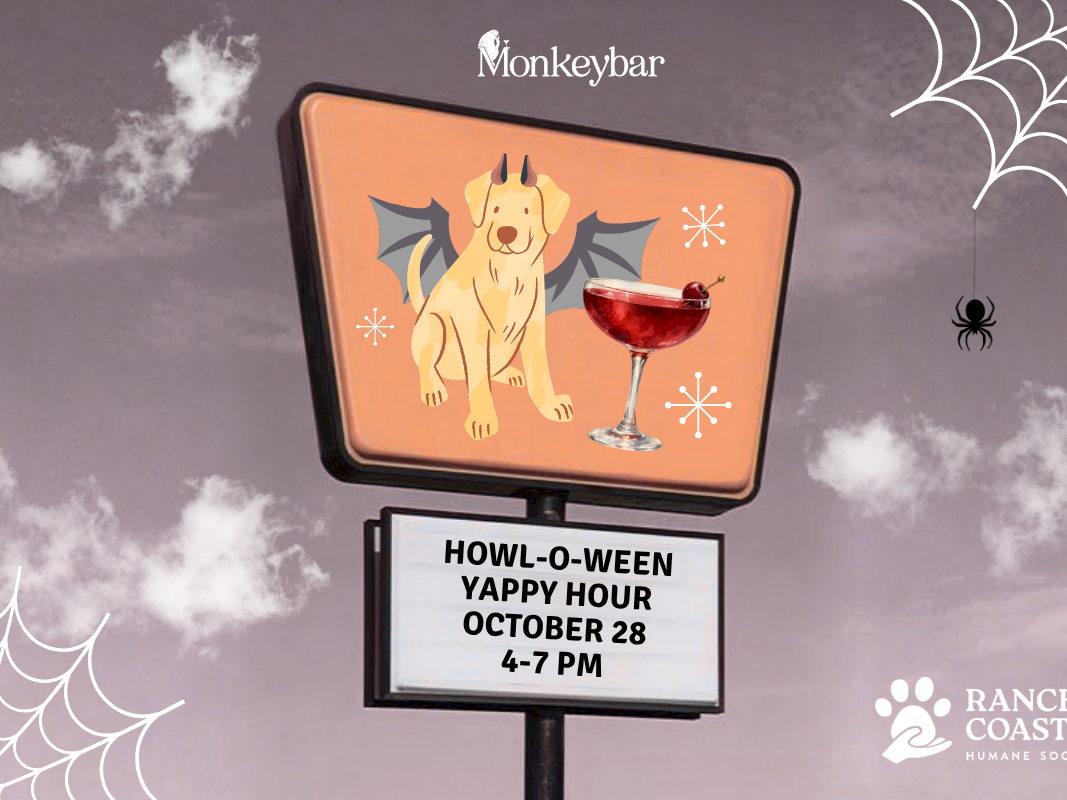 A Halloween dog bar ad on a billboard: Monkeybar &ldquo;Howl-o-Ween Yappy Hour&rdquo; Oct 28, 4&ndash;7 PM.