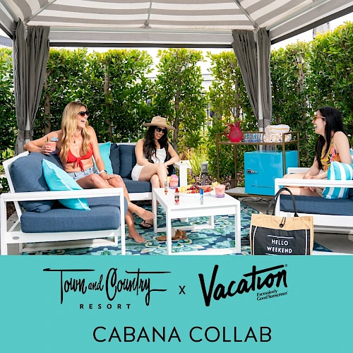 Four people relax in a stylish outdoor cabana with seating and greenery, promoting "Town and Country Resort x Vacation Cabana Collab."